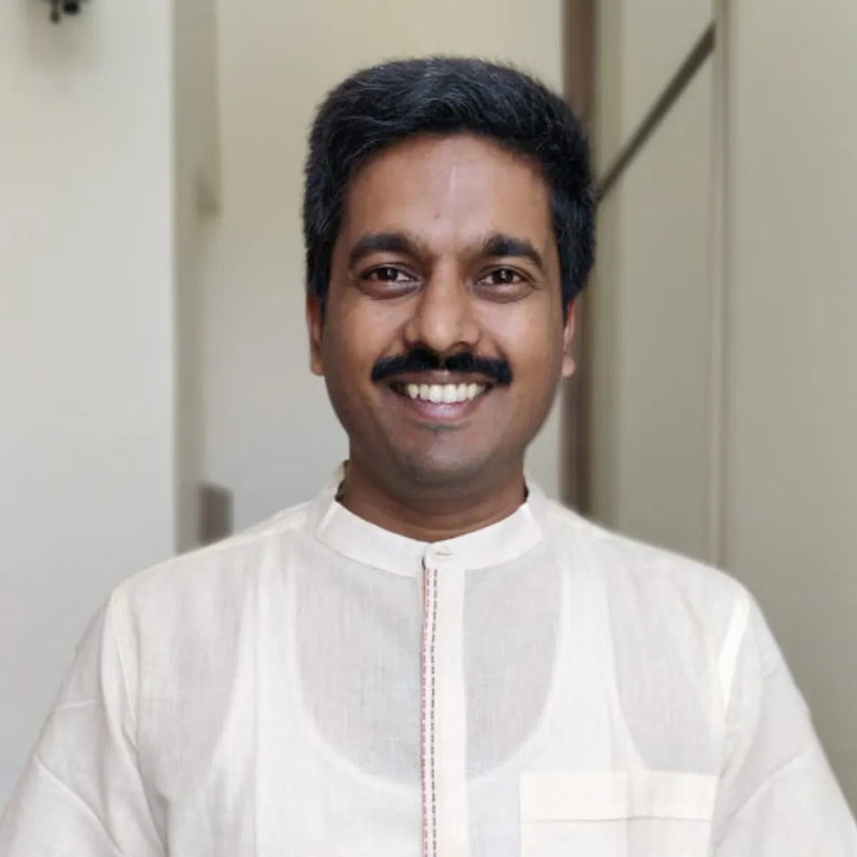 <span class="custom-clr">Sandesh Chidanand</span>